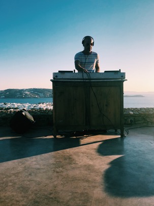 The DJ at 180 Degrees Sunset Bar (and insane view)