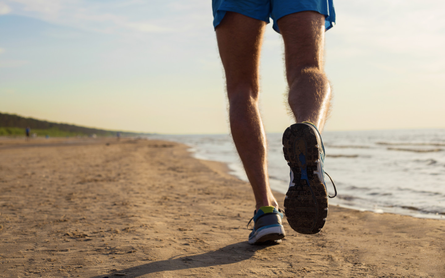 Be Mindful of your back and neck when running on the beach