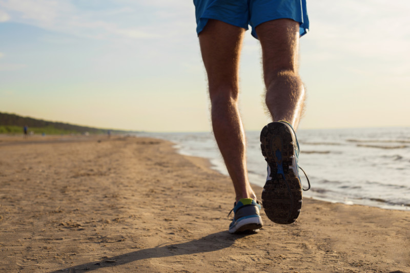 Be Mindful of your back and neck when running on the beach