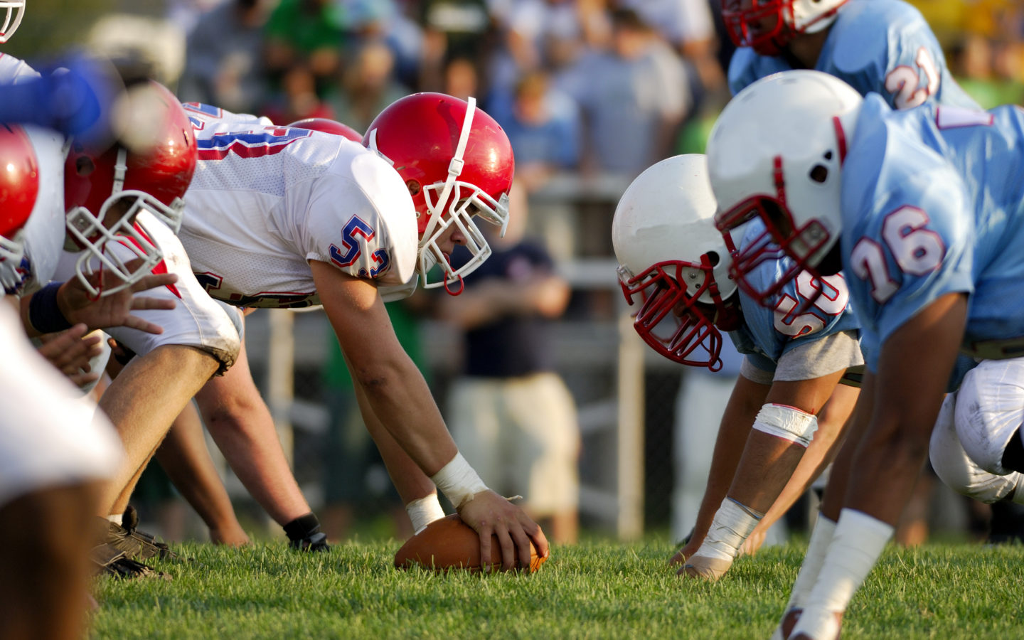 Teens Playing Scrimmage on the Football field, Randals Island